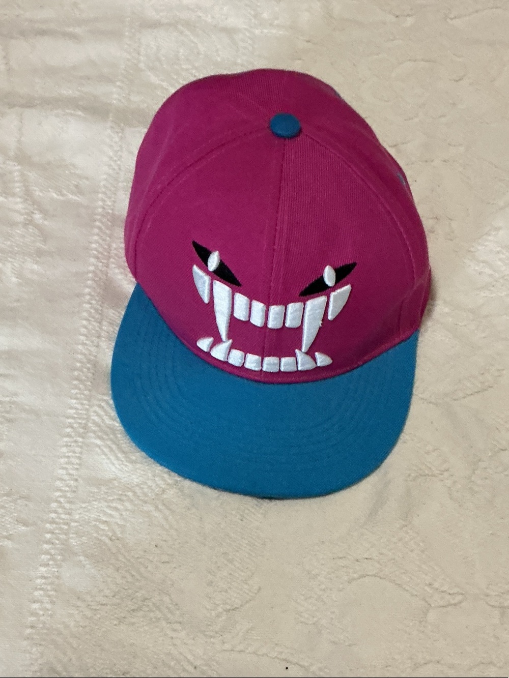 New Era Pink and Teal Snapback Hat with Embroidered Fang Face